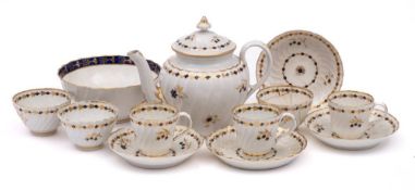 A First Period Worcester porcelain part tea service: of wrythen fluted form decorated in blue and
