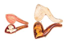 A late 19th century carved meerschaum pipe: in the form of a woman wearing a cockaded bicorn hat,