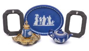 A group of Wedgwood jasper and basalt wares: comprising a brass-mounted inkwell,