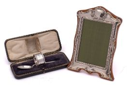 An Elizabeth II silver easel photograph frame, maker W I Broadway & Co, Birmingham,