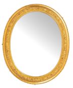 A Victorian giltwood and composition framed oval wall mirror, late 19th century,