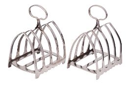 A pair of George V silver four-division toast racks, maker James Dixon & Sons Ltd, Sheffield,