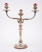 A plated twin branch candelabrum: with urn-shaped reeded sconces on swept reeded branches issuing