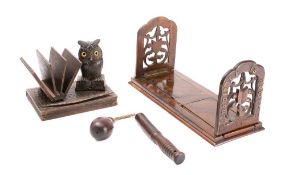 A Black Forest style desk stand: with owl inkwell, and open book for envelopes and paper,