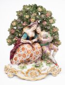 A Continental 'gold anchor' porcelain group: probably Paris and modelled as a courting couple