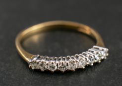 A 18ct gold and round, brilliant-cut diamond half-eternity ring,: total estimated diamond weight ca.