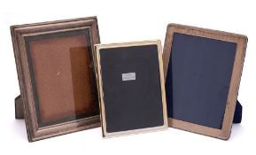 Two Elizabeth II silver photograph frames, various makers and dates: 32 x 27cm,