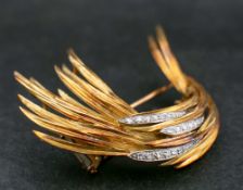 An 18ct gold and single-cut diamond brooch with sponsor mark by Garrad & Co in the form of a plume