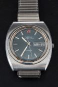 A stainless steel Omega 'Megaquartz' wristwatch,: the grey, circular dial with white baton numerals,