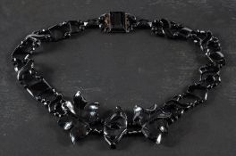 A carved jet necklace,