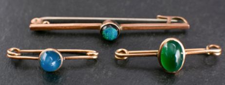 Three gemset bar brooches,: including an opal doublet bar brooch stamped '9CT', weight ca. 1.