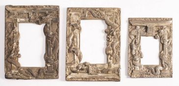 Three Chinese antimony frames: with low relief decoration of dragons entwined around temple gates,