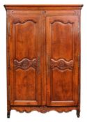 A French provincial oak armoire, last quarter 18th century,