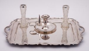 A silver plated rectangular serving tray: with moulded edge and loop carrying handles, 51cm wide,