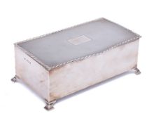A George VI silver cigarette box, maker William Adams Ltd, Birmingham,