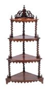 A Victorian rosewood four tier corner whatnot, circa 1880,