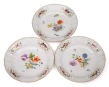 A set of three large Meissen dishes: with Dulong pattern rims moulded with flowers and palmettes,