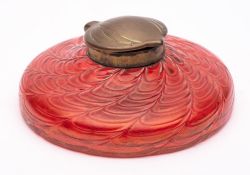A glass inkwell,