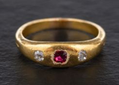 A ruby and old-cut diamond three stone ring,: total estimated diamond weight ca. 0.