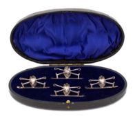 A set of four Edwardian novelty place names or menu holders, maker William Hutton & Sons Ltd,