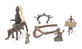 A Benin bronze figure group: of a warrior seated on the back of an elephant, 18cm long,