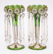 A pair of Bohemian green and white overlay glass lustres: each with serrated rim decorated with ten