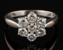 A diamond cluster ring,: set with brilliant cut diamonds, approximately 0.