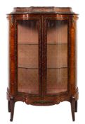 A kingwood, gilt metal mounted and glazed vitrine, in Louis XV transitional taste,