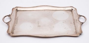 A silver plated serving tray: of rectangular outline,