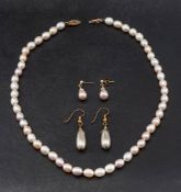A cultured pearl necklace and pair of earrings,