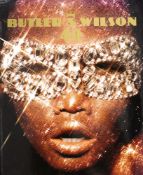 Four brooches by Butler and Wilson,: including a red crescent moon, a Martini glass,