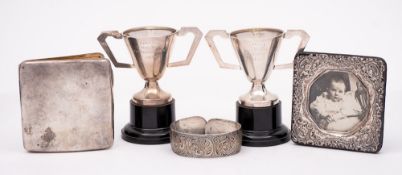 A mixed lot of silverwares, various makers and dates: includes silver bangle, photo frame,