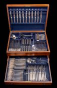 A plated part flatware service: includes twelve table knives, eleven dessert knives,