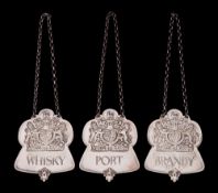 A set of three Elizabeth II silver jubilee spirit labels, maker Roberts & Belk Ltd, London,