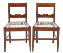 A pair of hardwood, probably padouk side chairs, possibly Anglo-Indian, circa 1820,