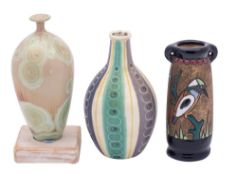 Three art pottery vases: comprising an Amphora Campina two handled vase enamelled with a Kingfisher,