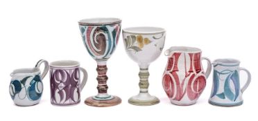 Aldermaston Pottery two goblets, three jugs and a mug: each with brushwork decoration,