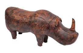 A brown leather covered stool in the form of a rhinoceros, in the manner of Liberty & Co.