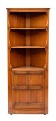 Ercol, a pair of stained elm corner cabinets,