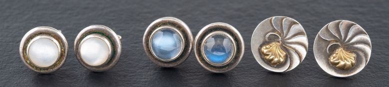 Three pairs of earstuds, including two silver pairs by Georg Jensen,