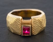 An 18ct gold, pink, rectangular, step-cut, synthetic spinel ring,