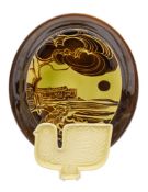 Two pieces of Poole Pottery: comprising a bird dish after a design by Robert Jefferson under lemon