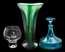 A cased art glass vase: of waisted triangular profile, the clear body with white and green interior,