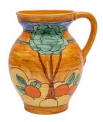 A Royal Cauldon pottery jug: tube lined with trees and oranges on an orange ground, printed marks,