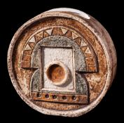 A Troika pottery wheel vase: decorated with raised abstract designs in cream,