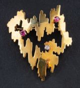 A 1960s 18ct gold, ruby and round brilliant-cut diamond, modernist brooch,