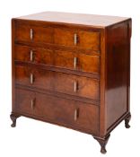 A walnut chest of drawers in Art Deco style, circa 1925,