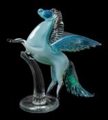 A Murano glass figure of Pegasus: the clear and pale blue beast in rearing posture with fanned tail