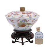 A Chinese famille rose 'dragon' bowl and cover: of ogee form with pierced square-section finial,