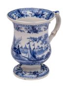 A mid 19th century English blue and white pearlware frog mug: of baluster form with scroll handle